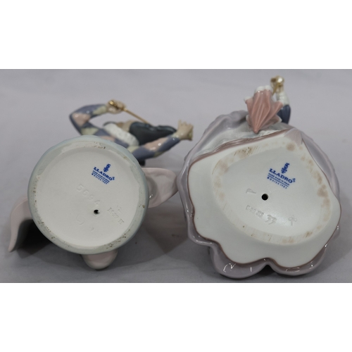 72 - A Lladro figure of a young standing lady holding a parasol, 18cm high and another Lladro figure of a... 