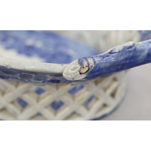 88 - A 19th Century oval blue and white 2-handled basket with figure on horseback and landscape decoratio... 