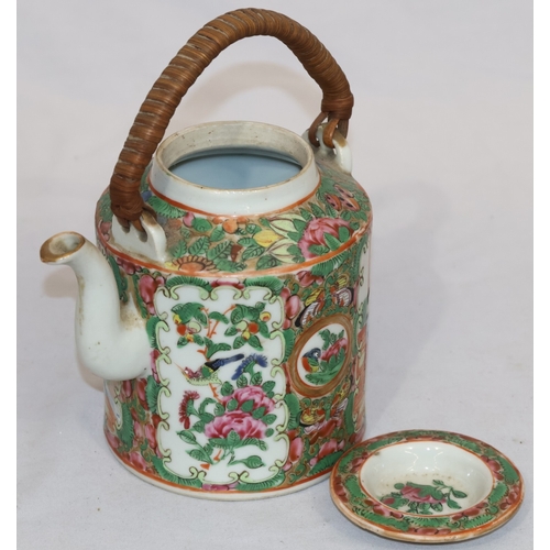 89 - A Cantonese round teapot with cover, wicker overhead handle, allover figure, bird, butterfly, floral... 