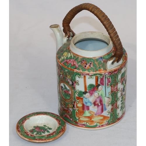 89 - A Cantonese round teapot with cover, wicker overhead handle, allover figure, bird, butterfly, floral... 