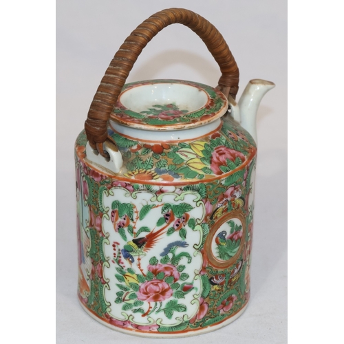 89 - A Cantonese round teapot with cover, wicker overhead handle, allover figure, bird, butterfly, floral... 