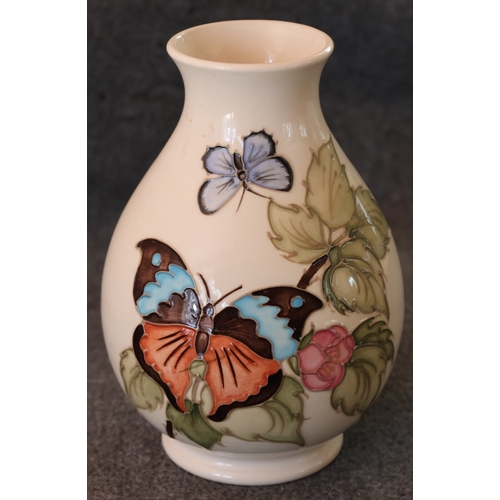 94 - Walter Moorcroft New Butterfly pattern round bulbous thin necked trumpet shaped vase, 19.5cm high