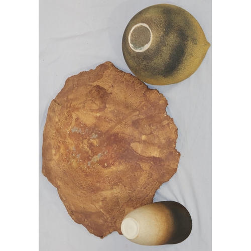 97 - A  Studio Pottery wood bark style scallop shaped shallow bowl, 39.5cm wide, a Studio Potter round bu... 