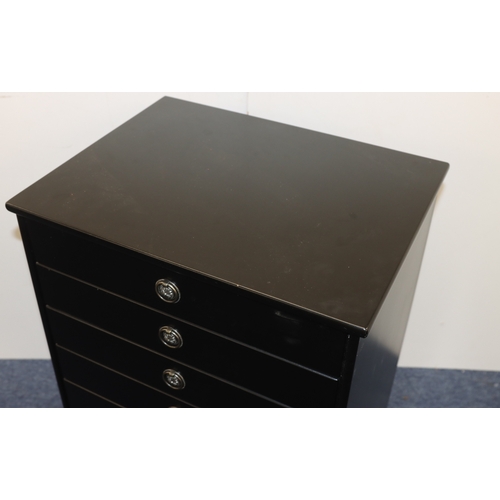4001 - A black music cabinet with 8 drawers, maker John Austin 53cm wide, 40cm deep, 79cm high.
