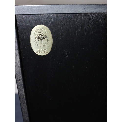 4001 - A black music cabinet with 8 drawers, maker John Austin 53cm wide, 40cm deep, 79cm high.
