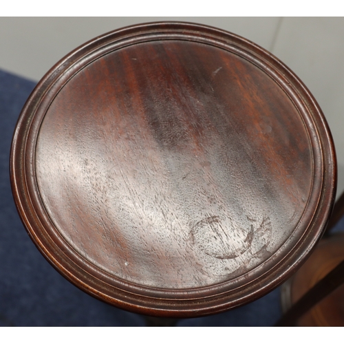 4002 - A mahogany torchiere, top, 29.5cm diameter, 94cm tall and another torchiere with inlaid detail to to... 