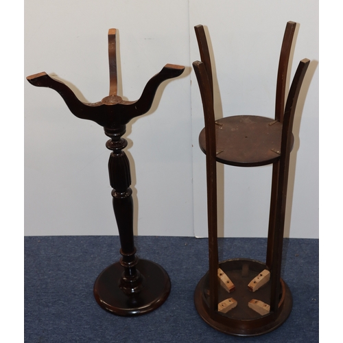 4002 - A mahogany torchiere, top, 29.5cm diameter, 94cm tall and another torchiere with inlaid detail to to... 