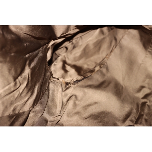 4015 - A light brown fur coat, size 12 label (small), 113cm long. shoulder to sleeve, 60cm. (Some loose sti... 
