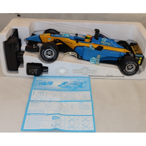 4020 - A Formula One Championship radio control scale 1/10 Racing car with manual and original box (box dam... 