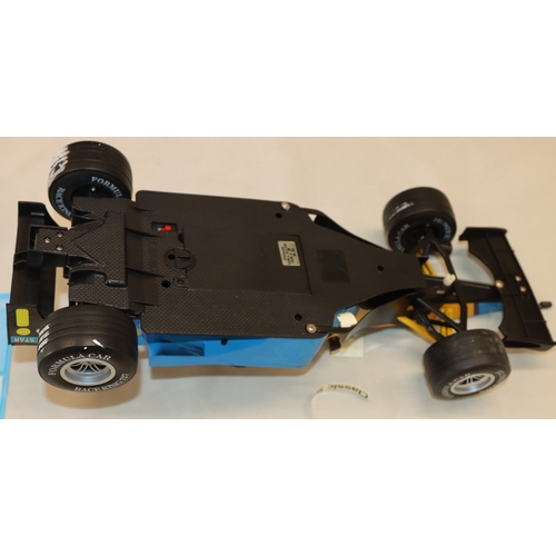 4020 - A Formula One Championship radio control scale 1/10 Racing car with manual and original box (box dam... 