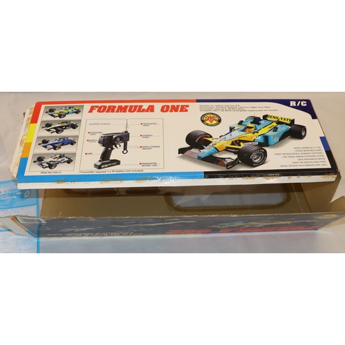 4020 - A Formula One Championship radio control scale 1/10 Racing car with manual and original box (box dam... 