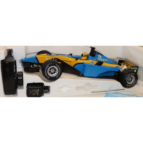 4020 - A Formula One Championship radio control scale 1/10 Racing car with manual and original box (box dam... 