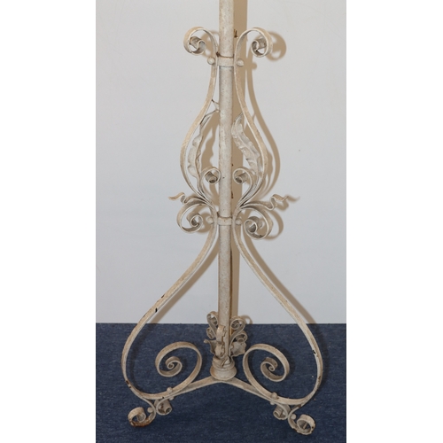 4026 - A painted cast iron floor lamp, 152cm high. (Will need rewiring and new bulb fitting)
