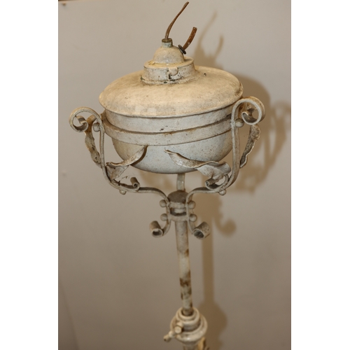 4026 - A painted cast iron floor lamp, 152cm high. (Will need rewiring and new bulb fitting)