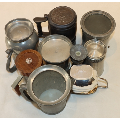 4048 - A quantity of various pewter tankards etc.
