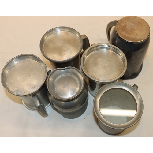 4048 - A quantity of various pewter tankards etc.