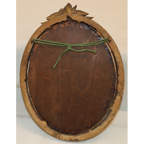 4061 - An oval miniature portrait of a young girl, 13.5cm x 12cm, in gilt frame (frame damaged, an inkwell ... 