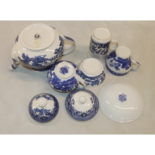 4066 - A blue and white part service, some stamped Churchill and Woods Ware, 5 large plates, 4 medium plate... 