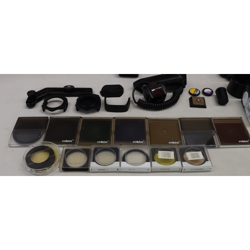 4072 - A large Lowepro camera rucksack with interior compartments, a Nikon F80 camera, No.2075641 (no lens)... 