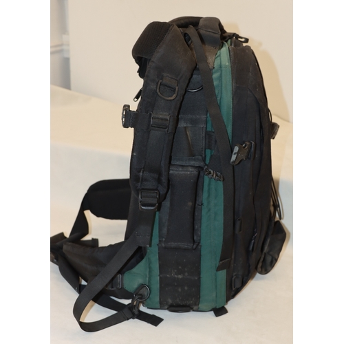4072 - A large Lowepro camera rucksack with interior compartments, a Nikon F80 camera, No.2075641 (no lens)... 