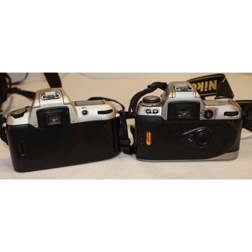 4072 - A large Lowepro camera rucksack with interior compartments, a Nikon F80 camera, No.2075641 (no lens)... 