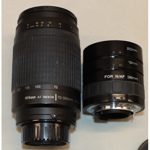 4072 - A large Lowepro camera rucksack with interior compartments, a Nikon F80 camera, No.2075641 (no lens)... 