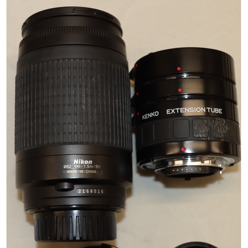 4072 - A large Lowepro camera rucksack with interior compartments, a Nikon F80 camera, No.2075641 (no lens)... 