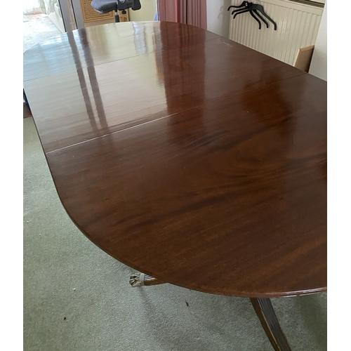4082 - THIS ITEM IS NOT HELD BY PFW. A mahogany D-end extending dining table on brass claw feet with castor... 