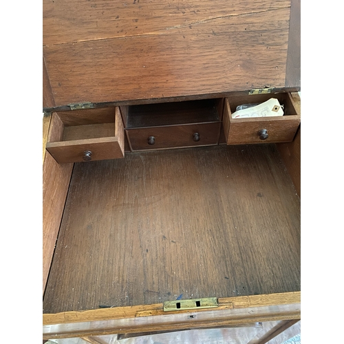 4084 - THIS ITEM IS NOT HELD BY PFW. A Victorian satin walnut and birch Davenport (lock faulty on 2 lower d... 