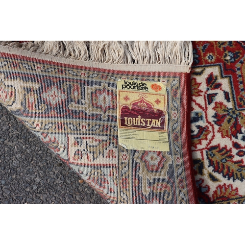 4096 - A Belgian machine made wool rug, 122cm x 168cm (some marks).