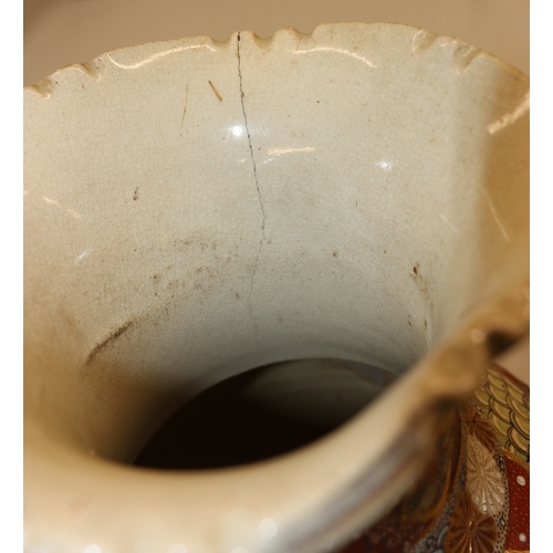 4097 - An Oriental Satsuma bulbous vase (crack to rim and raised rope detail damaged) with wood stand (spli... 