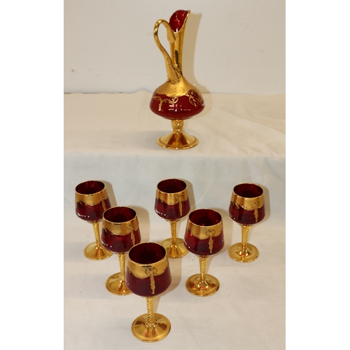 4099 - A vintage Murano style Venetian set of 6 goblets and matching jug, 32.5cm high.
