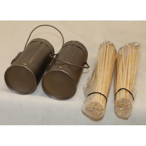 4102 - A pair of metallic matchstick holder miniature coal skuttles, 22cm high including handles.