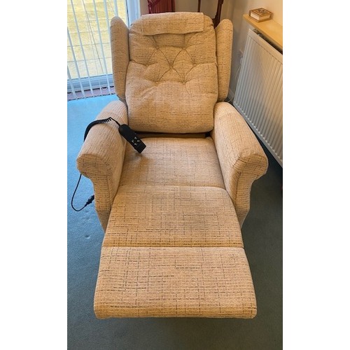 4042 - THIS LOT IS NOT HELD BY PFW. An electric recliner and stand-up chair, 80cm wide, 95cm deep, 105cm hi... 