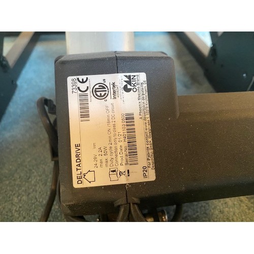4042 - THIS LOT IS NOT HELD BY PFW. An electric recliner and stand-up chair, 80cm wide, 95cm deep, 105cm hi... 