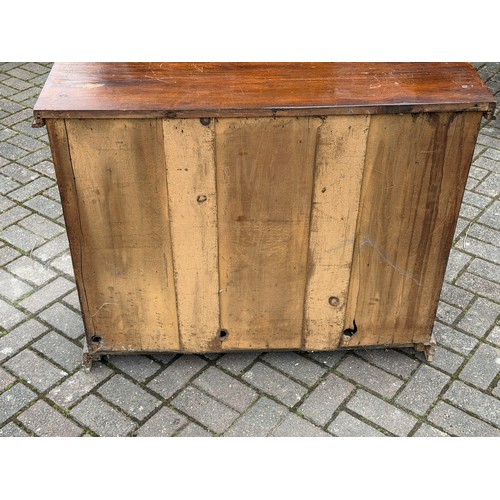4092 - A 19th Century serpentine top cabinet over 1 long drawer and 2 panel doors, barley twist supports, 1... 