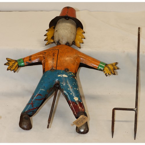 4106 - A Forge & Foundry tin plate scarecrow, 105cm long overall.