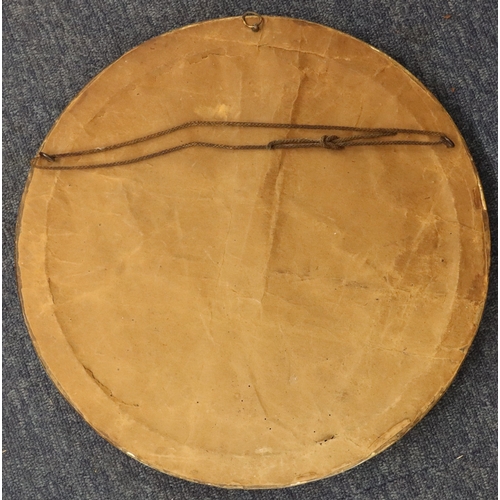 6032 - A circular print in gilt frame, 35.5cm diameter.
