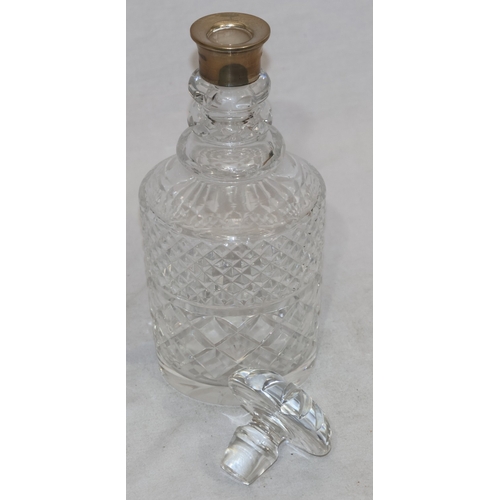 274 - A cut glass round decanter with ring neck, London silver top and mushroom stopper (not fitting), 28c... 
