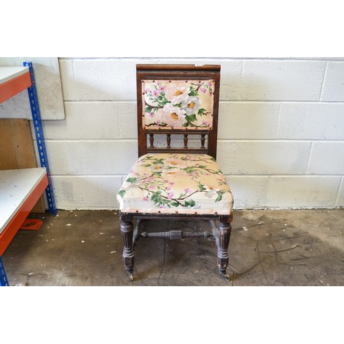 63 - A Vintage Bedroom Chair With Wheels