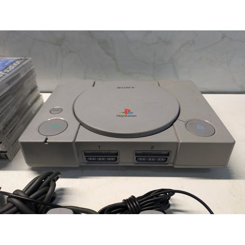 119 - Sony Playstation 1 Original Console With A Selection Of 6 Games