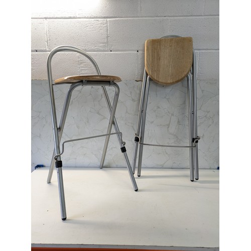 56 - A Pair Of Folding Chairs - Wood Bases With Metal Frames