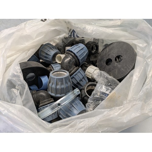 29 - A Bag Of Dozens Of Heavy Duty Plumbing Fittings