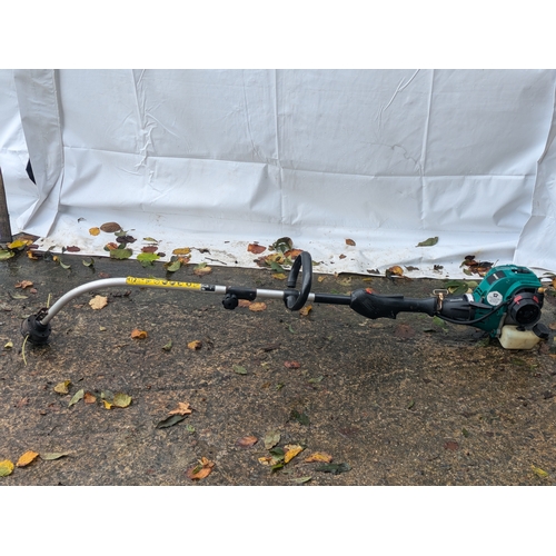 44 - A Qualcast Model TE30H Petrol Strimmer