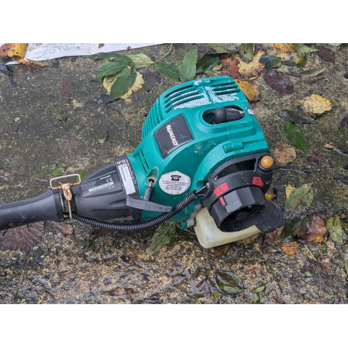 44 - A Qualcast Model TE30H Petrol Strimmer