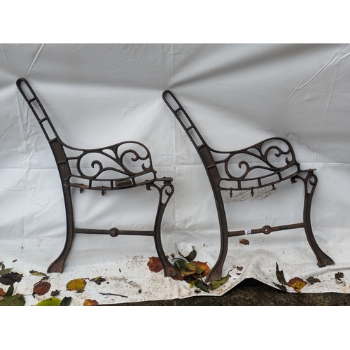 67 - A Pair Of Cast Iron Bench Ends