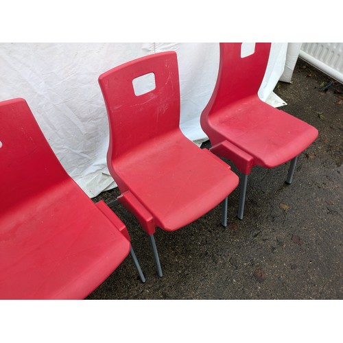 100 - A Set Of 5 Red Plastic Chairs