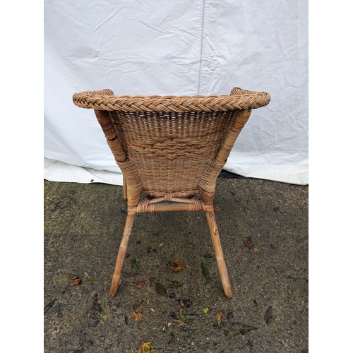 112 - A Wicker Armchair