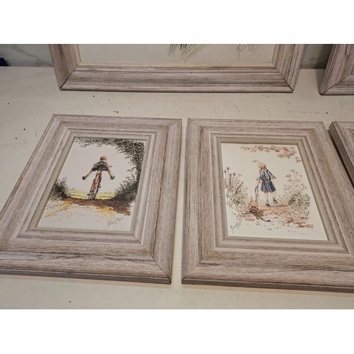 110 - A selection of pictures by Michael Cooper in wood frames