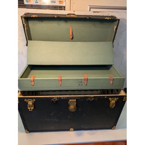 102 - a canvas travel case with wardrobe compartment